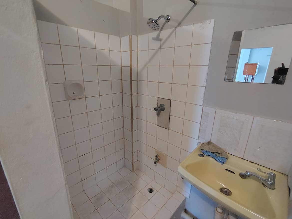 Cornerstone™ EMR Tacarigua Apt 4 Bathroom Cornerstone- Bathroom with shower and sink in Cornerstone™ EMR Tacarigua Apt 4.