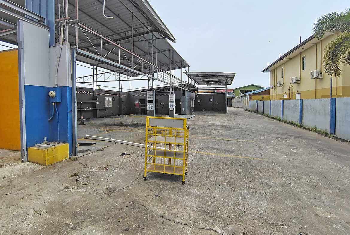 Cornerstone- Industrial facility with storage units and loading area at Off Johnny King Road.