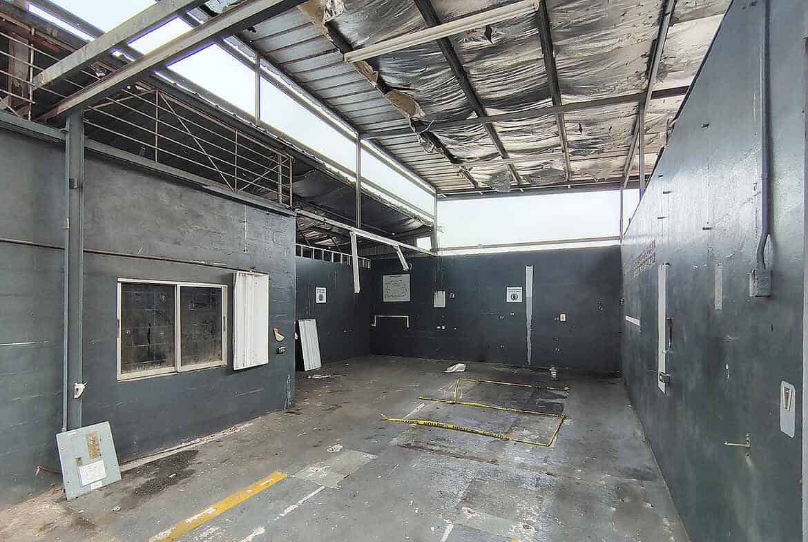 Cornerstone- Unfinished building structure with exposed roof and walls at Off Johnny King Road.