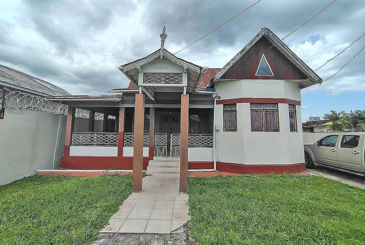 Cornerstone- Residential house on Carlos Street in Woodbrook with traditional architecture.