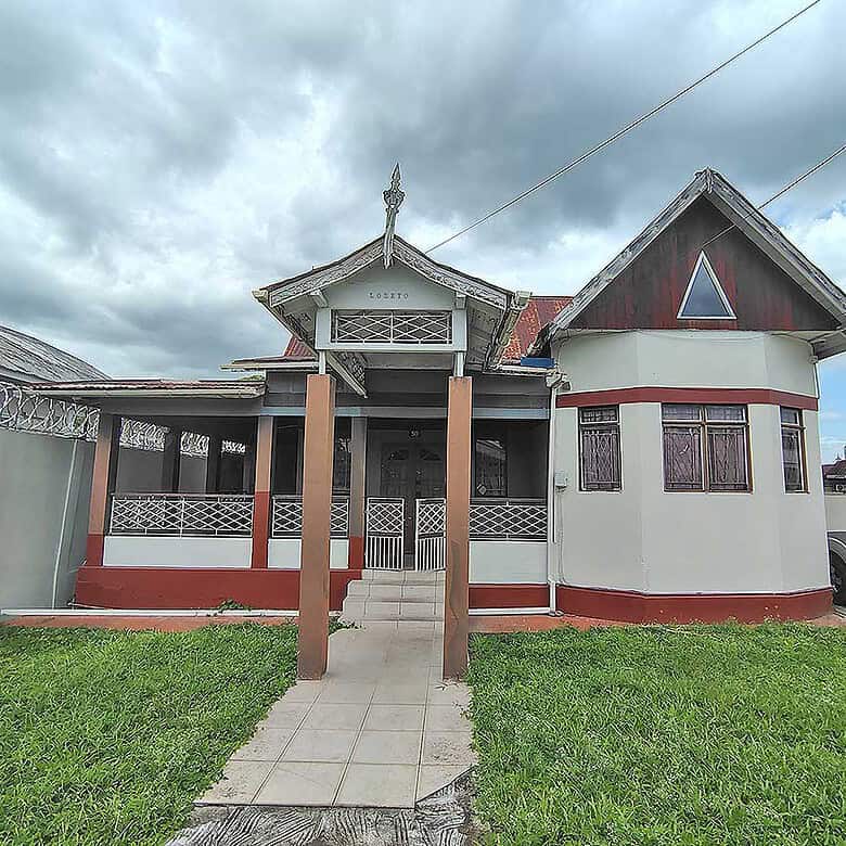 Cornerstone- Residential house on Carlos Street in Woodbrook with traditional architecture.