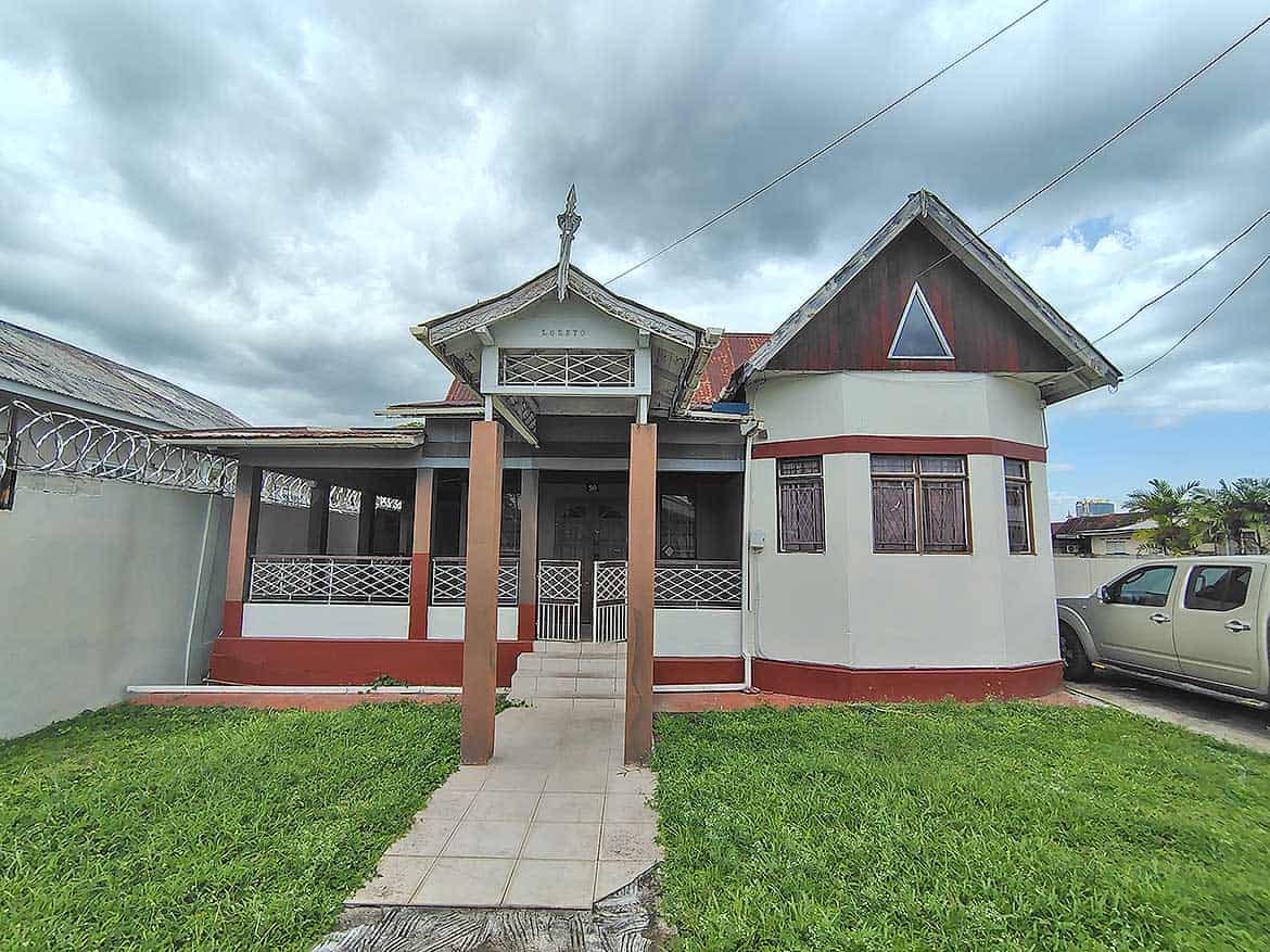 Cornerstone- Residential house on Carlos Street in Woodbrook with traditional architecture.