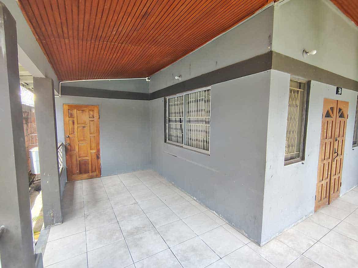 Cornerstone™ Property on Carlos Street Cornerstone- Exterior view of Cornerstone™ property on Carlos Street, Woodbrook.