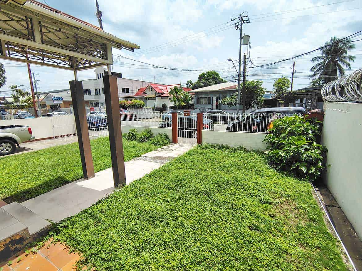 Cornerstone™ Residential Entrance Cornerstone- Residential entrance with pathway and greenery in Woodbrook.