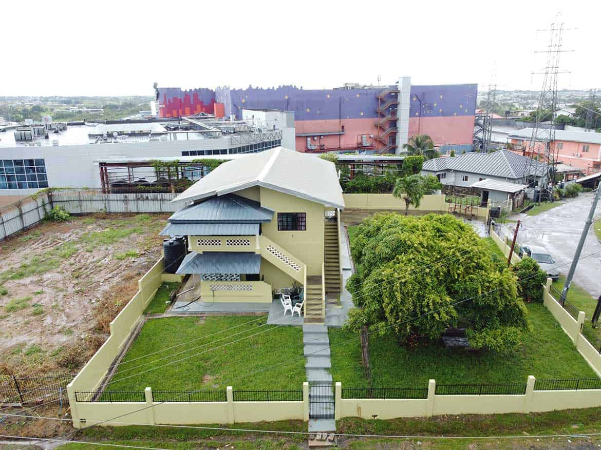 Cornerstone- Contemporary house with lush garden and fenced yard in Corinth.