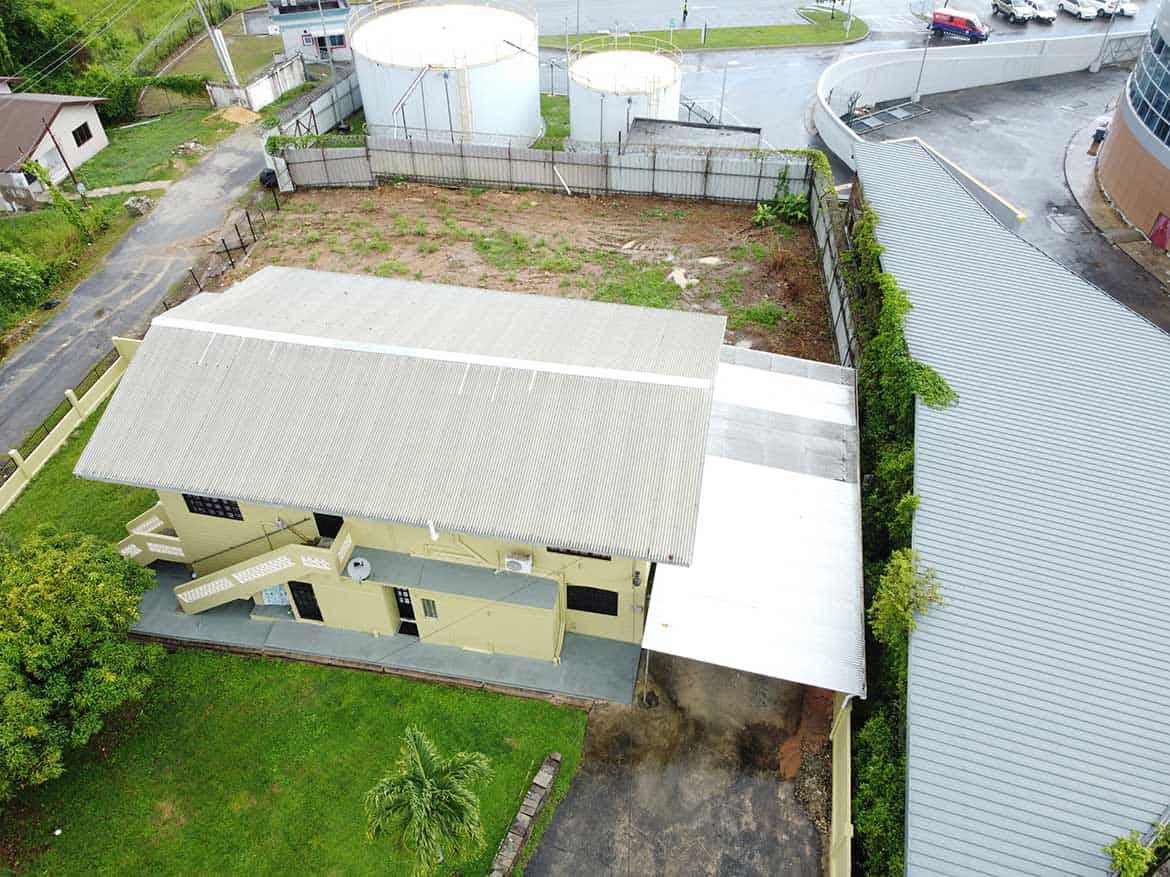 Residential Property on Braemar Road Cornerstone- Aerial view of a residential property on Braemar Road, Corinth with a large roof and surrounding lot.