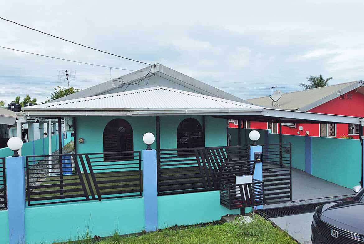 Cornerstone- Vibrant turquoise house with black accents in Cashew Gardens, Edinburgh.