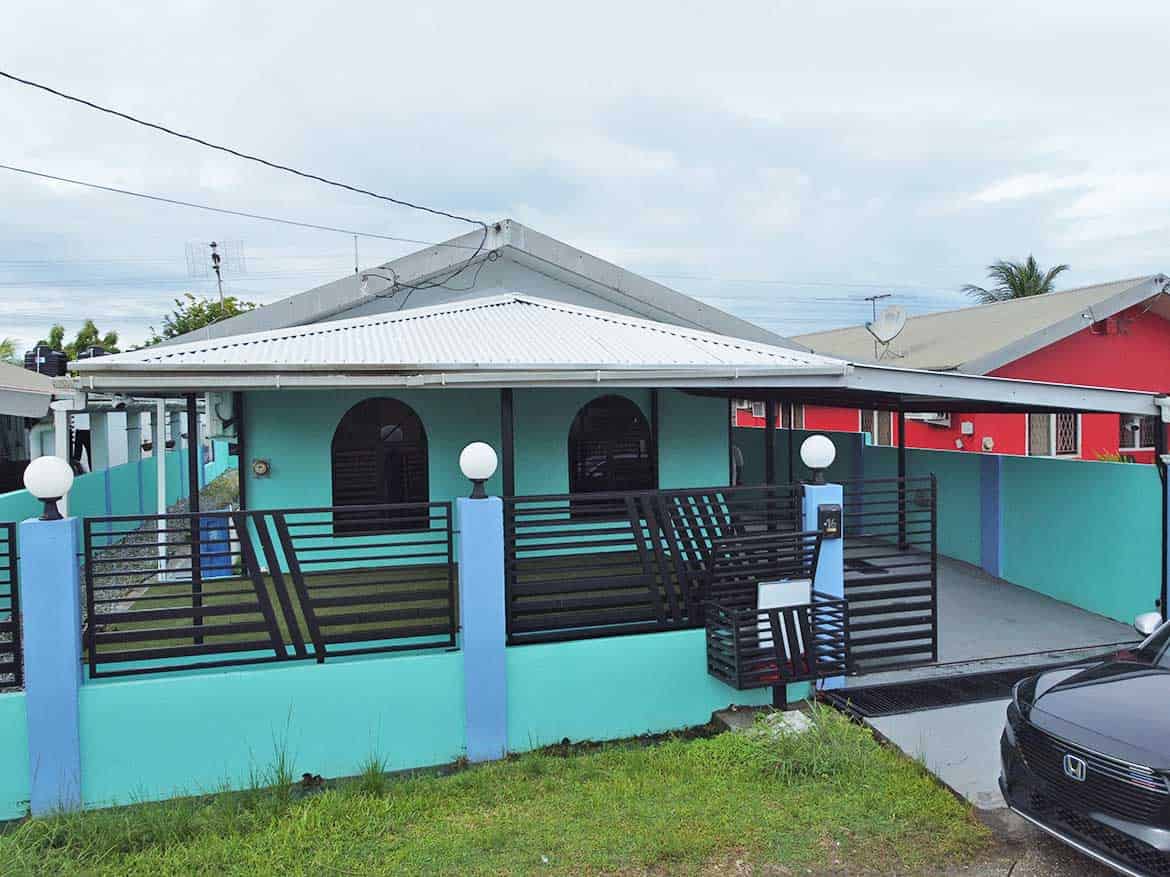 Cornerstone- Vibrant turquoise house with black accents in Cashew Gardens, Edinburgh.
