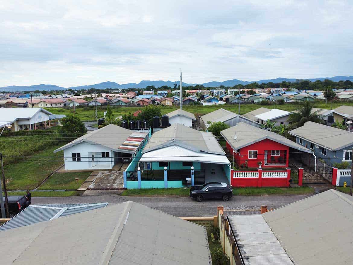Cornerstone™ Residential Area View Cornerstone- Residential neighborhood in Edinburgh with colorful houses and mountain backdrop.