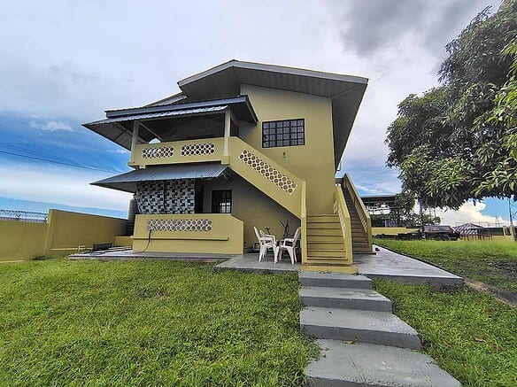 Cornerstone- Contemporary house with multiple levels and outdoor staircase in Corinth.